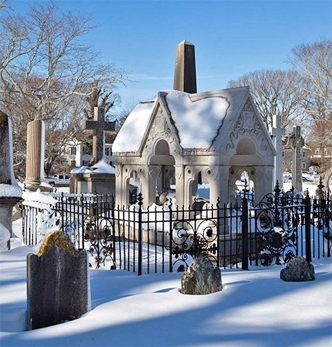decorative image of snow on a Hamptons graveyard